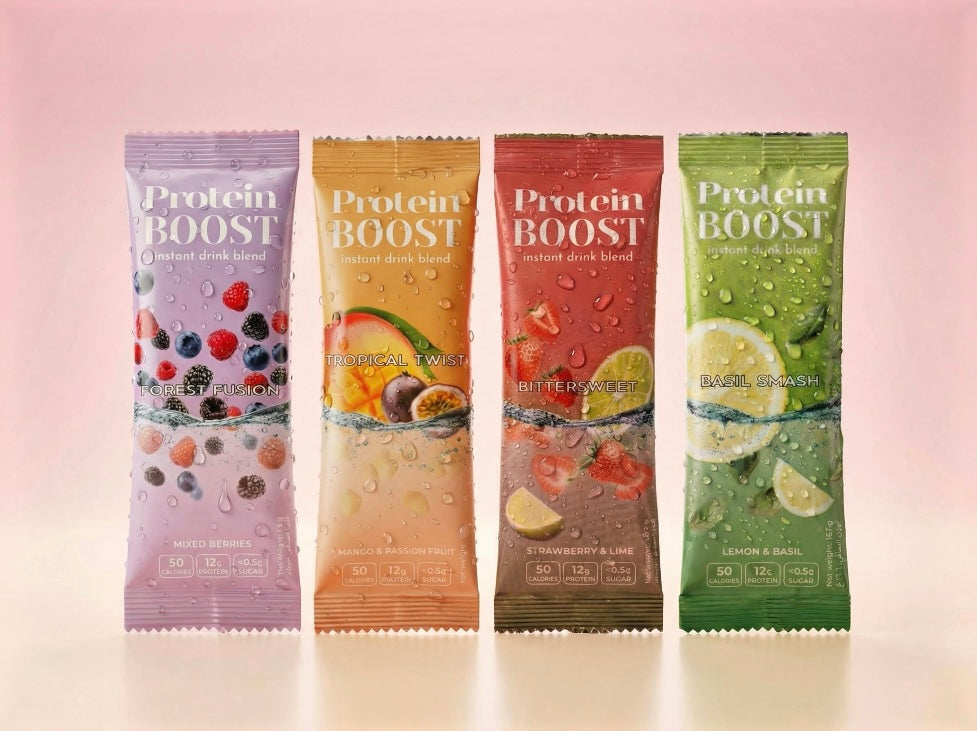 Four protein boost packages with different fruit images on a gradient background