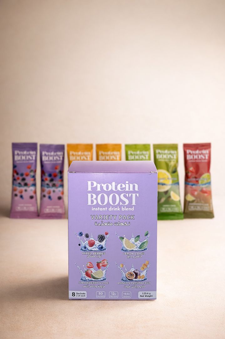Box of Protein Boost with colorful packets on a beige background